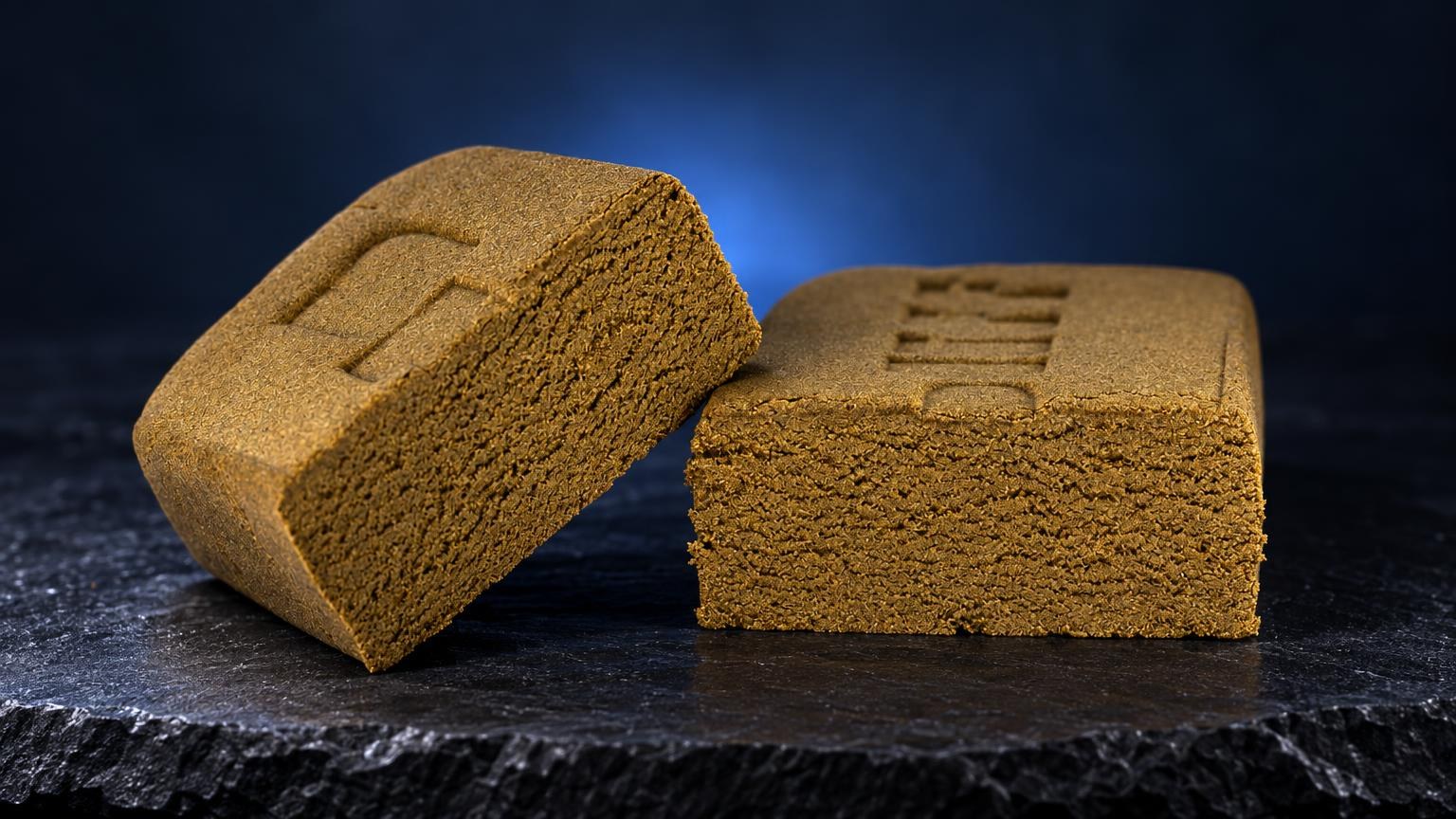 How to Smoke Hash: golden Hash blocks with textured granular surface and golden-brown color on dark slate background