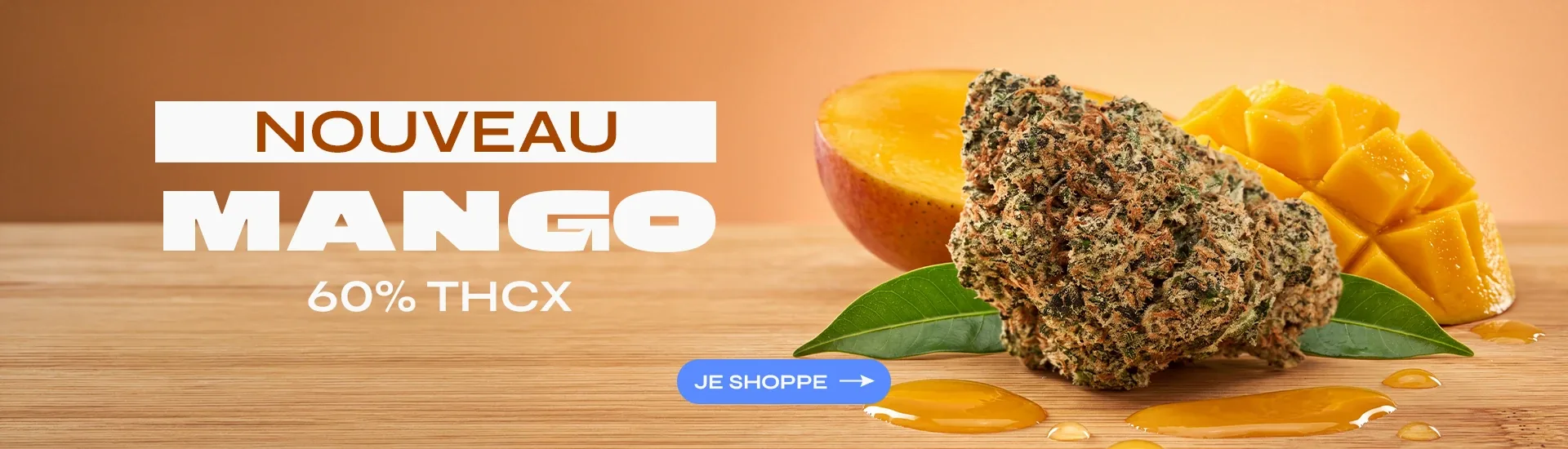 Nouveau Mango 60% THCX : fleur THCX posée sur une planche en bois à côté d’une mangue découpée